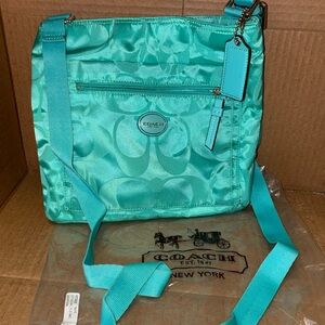 Vibrant Turquoise Coach Crossbody bag with Tan Interior